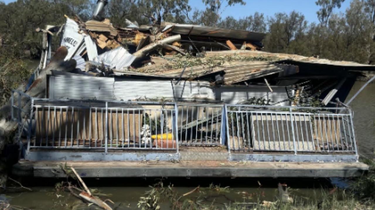 The houseboat was completely destroyed by the falling tree.