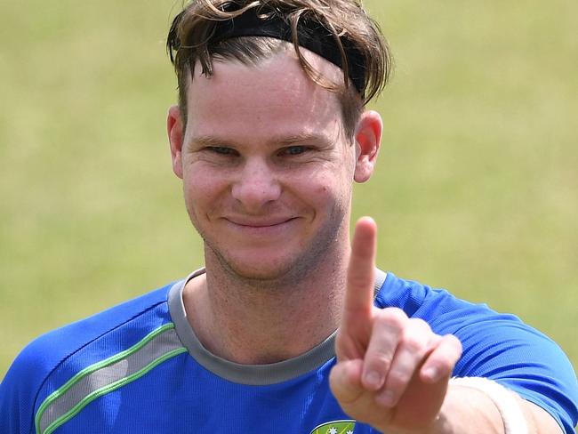 Australia's captain Steve Smith gestures during a training session on the eve of fourth and last cricket Test match between India and Australia at The Himachal Pradesh Cricket Association Stadium in Dharamsala on March 24, 2017. ----IMAGE RESTRICTED TO EDITORIAL USE - STRICTLY NO COMMERCIAL USE----- / GETTYOUT---- / AFP PHOTO / PRAKASH SINGH / ----IMAGE RESTRICTED TO EDITORIAL USE - STRICTLY NO COMMERCIAL USE----- / GETTYOUT