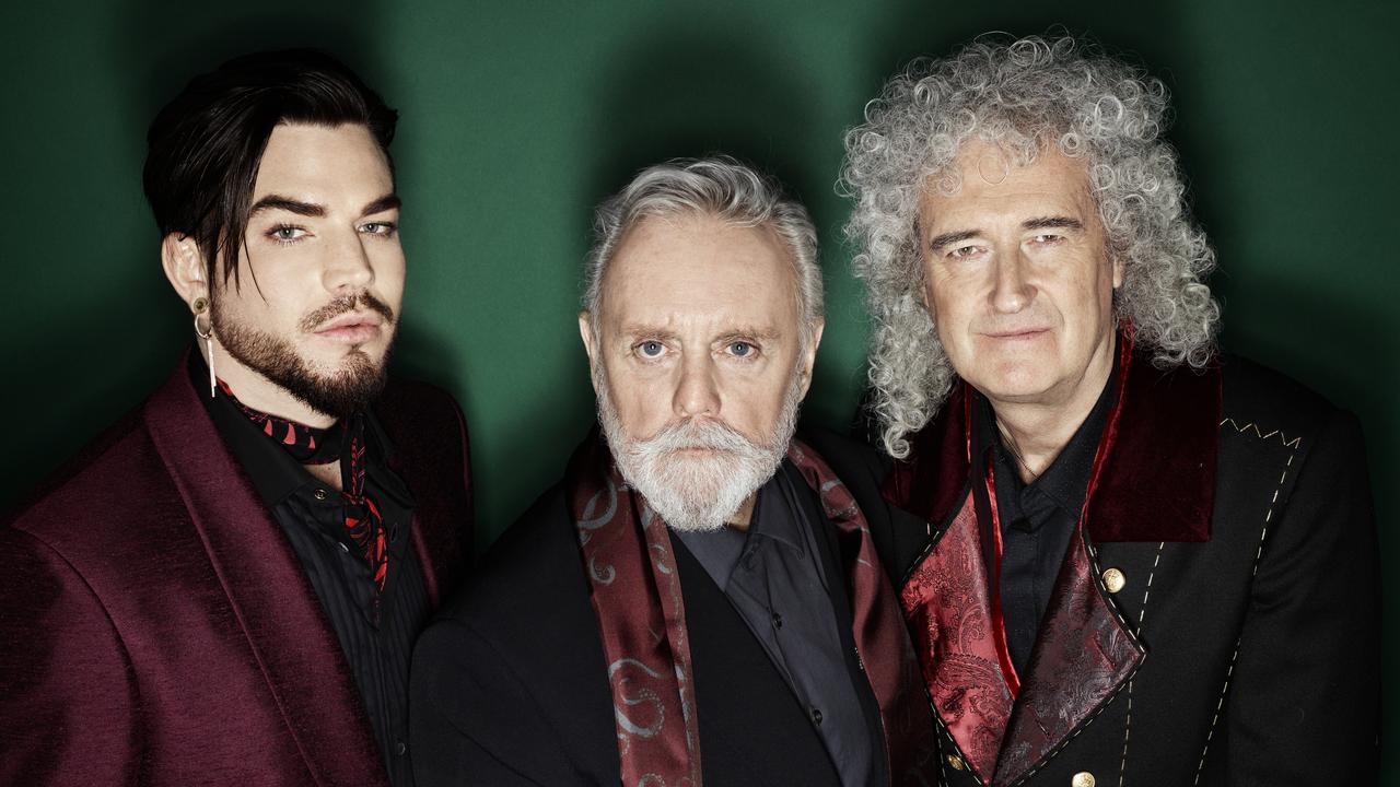 L-R: Adam Lambert with Roger Taylor and Brian May of Queen.