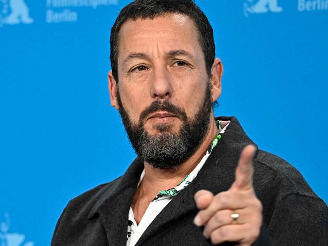 US actor Adam Sandler poses during a photo call for the film 'Spaceman' presented in the Berlinale Special Gala at the 74th Berlinale, Europe's first major film festival of the year, in Berlin on February 21, 2024. (Photo by Tobias SCHWARZ / AFP)