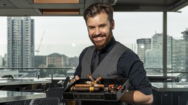 James Heggie at Skye Bar, which mixes cigars with cocktails. Picture: Monique Harmer