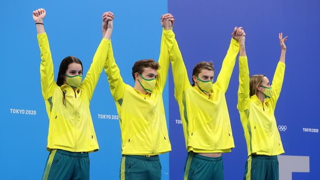 Bronze medalists Kaylee McKeown, Zac Stubblety-Cook, Matthew Temple and Emma McKeon of Team Australia celebrate during the medal ceremony for the Mixed 4 x 100m Medley Relay Final at Tokyo Aquatics Centre on July 31, 2021 in Tokyo, Japan. (Photo by Clive Rose/Getty Images)