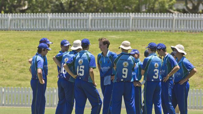 Morgan Galvin (centre) celebrates with his Darling Downs and South West after bowling out a Gold Coast player during a Lord Taverners match at Toowoomba Grammar School in 2018