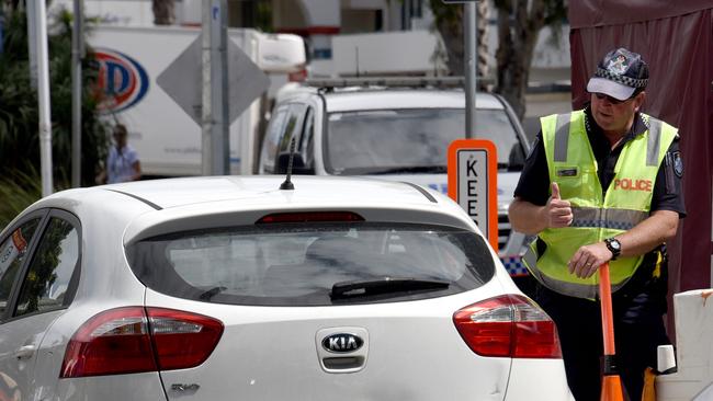 Police monitor the Queensland-NSW border at Coolangatta. Picture: NCA NewsWire/Steve Holland