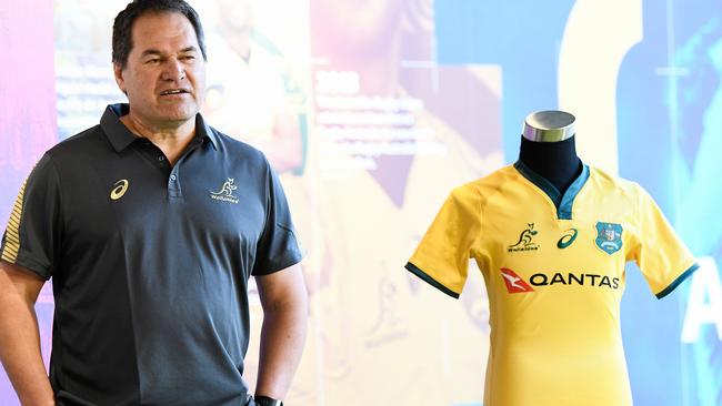 New Wallabies Head Coach Dave Rennie next to a Qantas adornd jersey. (AAP Image/Bianca De Marchi)