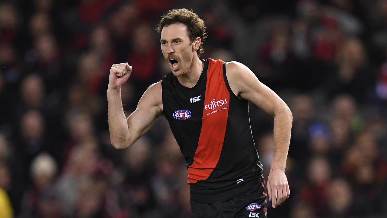 Mitch Brown of the Bombers reacts after kicking a goal during the Round 19 AFL match between the Essendon Bombers and the Sydney Swans at Etihad Stadium in Melbourne, Friday, July 27, 2018. (AAP Image/Julian Smith) NO ARCHIVING, EDITORIAL USE ONLY