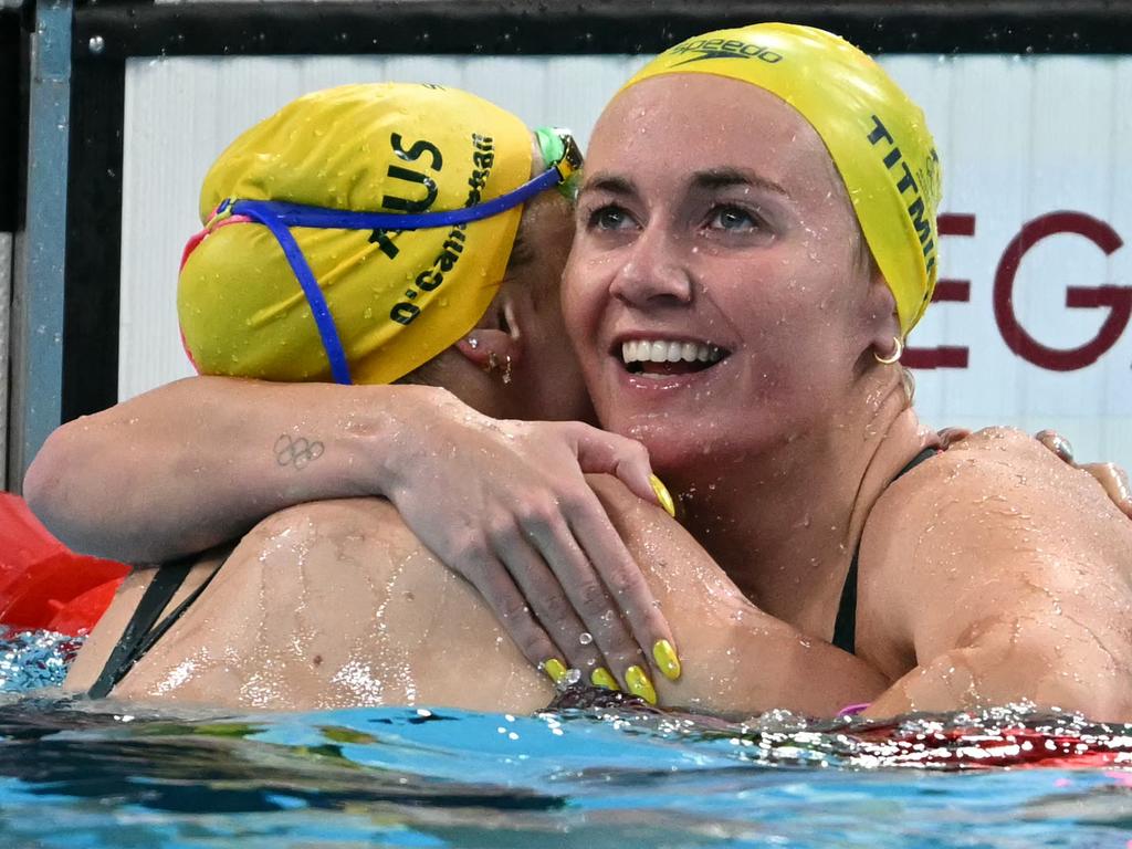 ‘Like an absolute champion!’ Mollie O'Callaghan, left, and Ariarne Titmus embraced in the water after THAT race in Paris. Picture: AFP