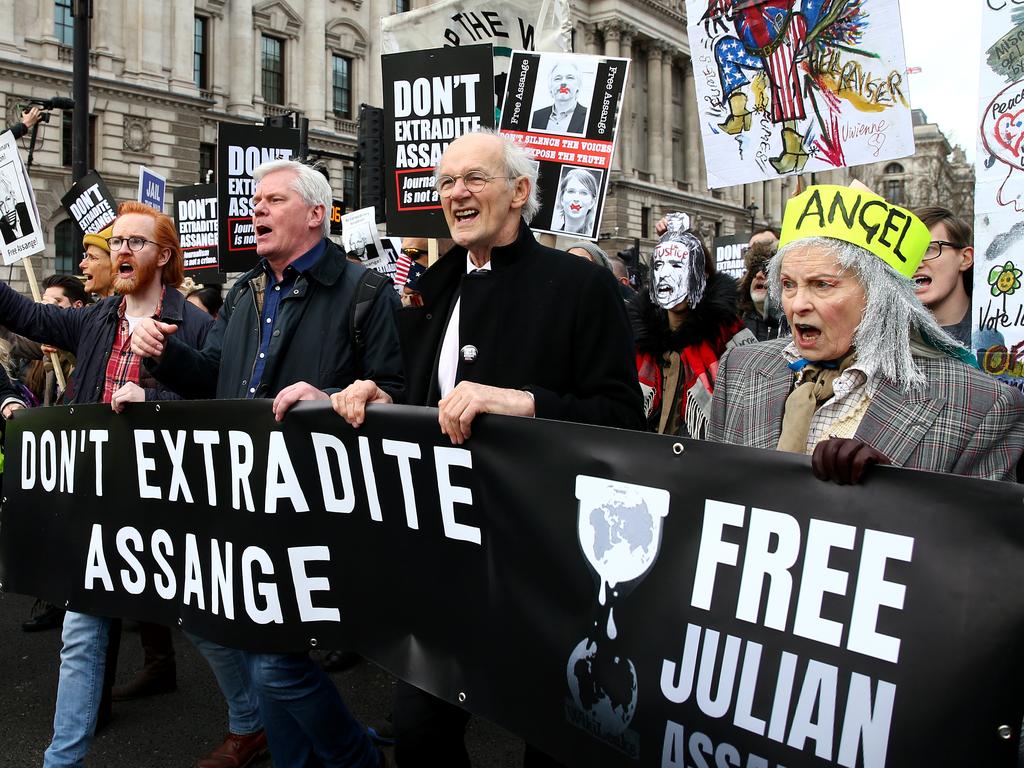 WikiLeaks editor-in-chief Kristinn Hrafnsson, Julian Assange's father John Shipton, and fashion designer Vivienne Westwood, march together in London, England in 2020. Picture: Getty Images