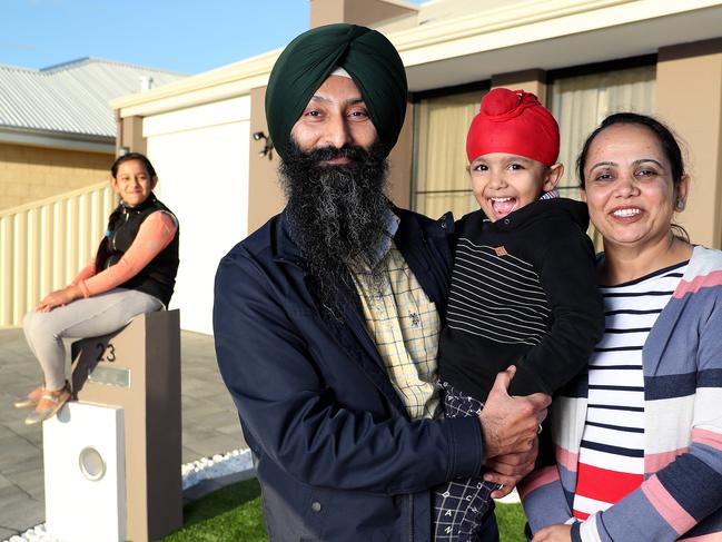 19/07/28Gurpreet Singh Sidhu with family at Canning Vale. Wife Gagandeer Kaur and children Harnoor (11, daughter) and son Birfateh (4). They moved from India in 2013.Pic Colin Murty The Australian