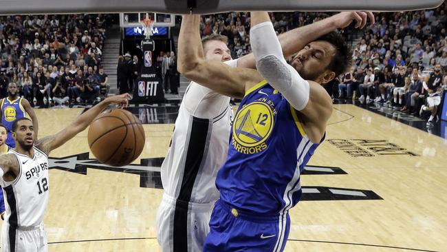 Andrew Bogut (no.12) makes a big return for the Golden State Warriors yesterday. Picture: AP