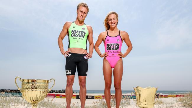 Matt Bevilacqua and Georgia Miller eye off Coolangatta Gold trophies. Photo: Tim Marsden