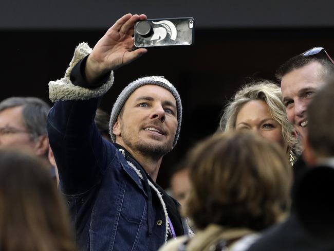 Dax Shepard, left, takes selfie on the sideline, before the NFL Super Bowl 52 football game between the Philadelphia Eagles and the New England Patriots on February 4, 2018 in Minneapolis, Minnesota. Picture: AP
