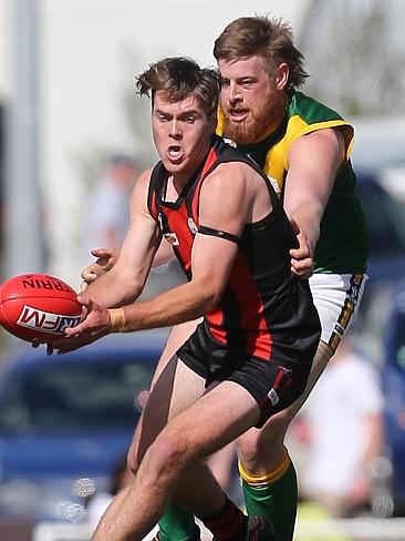 Gippsland Football League Grand Final match between Maffra Eagles and Leongatha Parrots. Maffra became the 2016 premiers, defeating Leongatha 13.10 (88) to 9. 16 (67). Lachlan Channing is followed closely by Ben Willis. Picture: Yuri Kouzmin