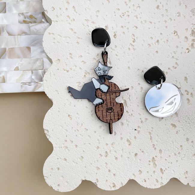 Galactic Burriot earrings, inspired by the iconic musical clock in Hobart’s Cat & Fiddle Arcade. Picture: Supplied