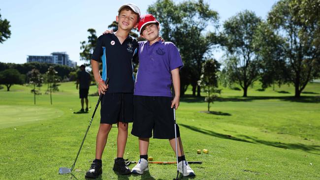 Jamie Armitage and Harry Chipkin are worried plans to carve up Moore Park Golf Club will mean they will miss opportunities to play. Picture: Rohan Kelly