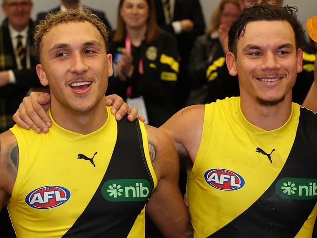 PERTH, AUSTRALIA - JUNE 10: Marlion Pickett, Shai Bolton and Daniel Rioli of the Tigers sing their club song after winning the round 13 AFL match between Fremantle Dockers and Richmond Tigers at Optus Stadium, on June 10, 2023, in Perth, Australia. (Photo by Paul Kane/Getty Images)