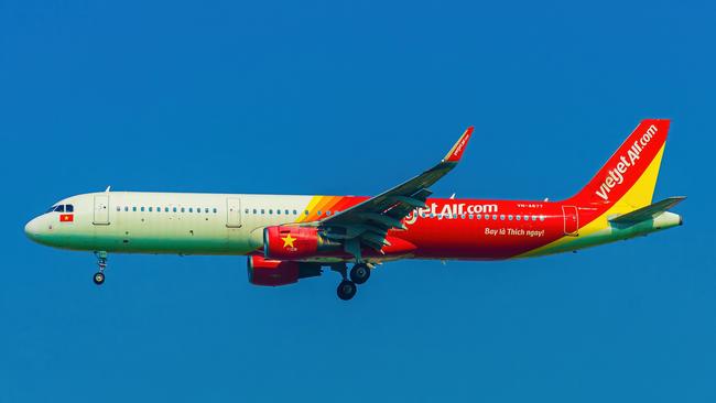 A Vietjet plane landing into Tan Son Nhat International Airport