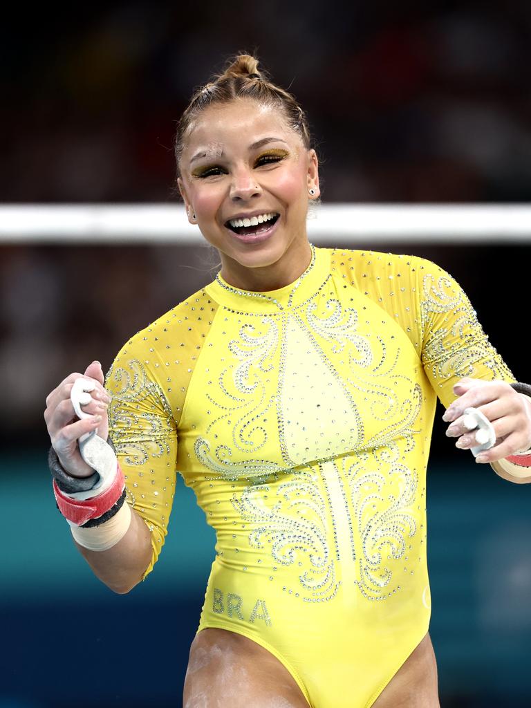 Flavia Saraiva after her uneven bars routine. Photo by Naomi Baker/Getty Images