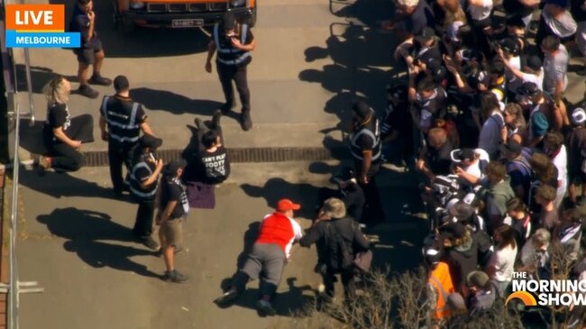 The disruption continued for a few minutes before the parade could resume. Picture: 7 News