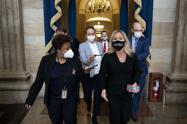 WASHINGTON, DC - JANUARY 13: Rep. Marjorie Taylor Green (R-GA) wears a protective mask reading Censored at the U.S. Capitol on January 13, 2021 in Washington, DC. The House of Representatives is expected to vote to impeach President Donald Trump later today, after Vice President Mike Pence declined to use the 25th amendment to remove him from office after protestors breached the U.S. Capitol last week. Stefani Reynolds/Getty Images/AFP