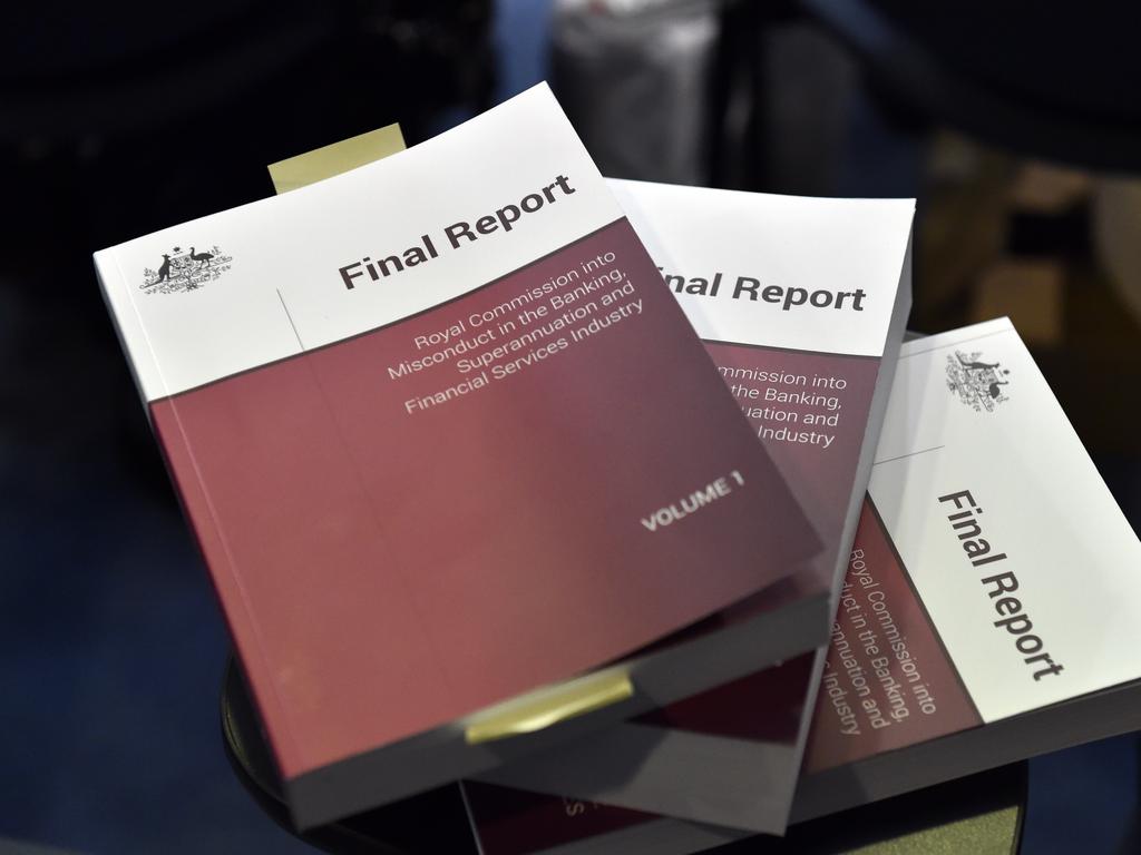 A copy of the report is seen at Treasurer Josh Frydenberg's press conference in response to the releasing of the Banking Royal Commission findings at Parliament House in Canberra, Monday, February 4, 2019. (AAP Image/Mick Tsikas) NO ARCHIVING