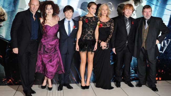 Actors Ralph Fiennes, Helena Bonham Carter, Daniel Radcliffe, Emma Watson, author J.K. Rowling, and actors Rupert Grint and Timothy Spall attend the World Premiere of Harry Potter And The Deathly Hallows: Part 1 at Odeon Leicester Square  on November 11, 2010. Photo by Dave M. Benett/Getty Images.