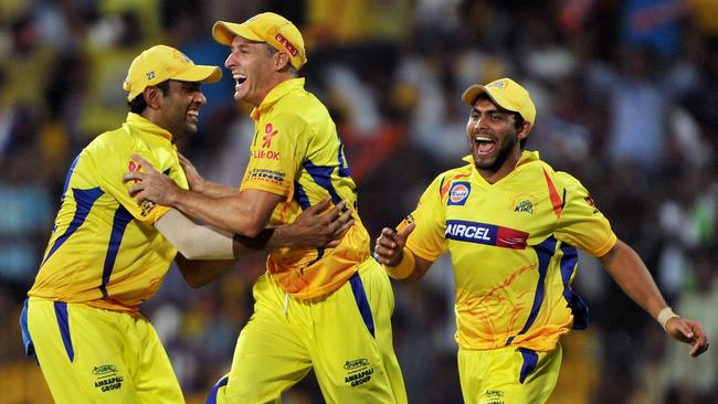 Michael Hussey celebrates with teammates during a match with the Chennai Super Kings in 2012.