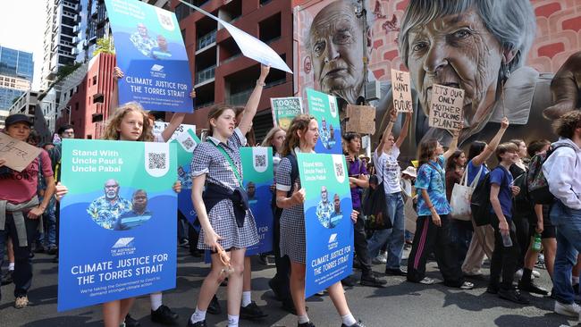 Students march through the streets of Melbourne CBD. Picture: Mark Stewart