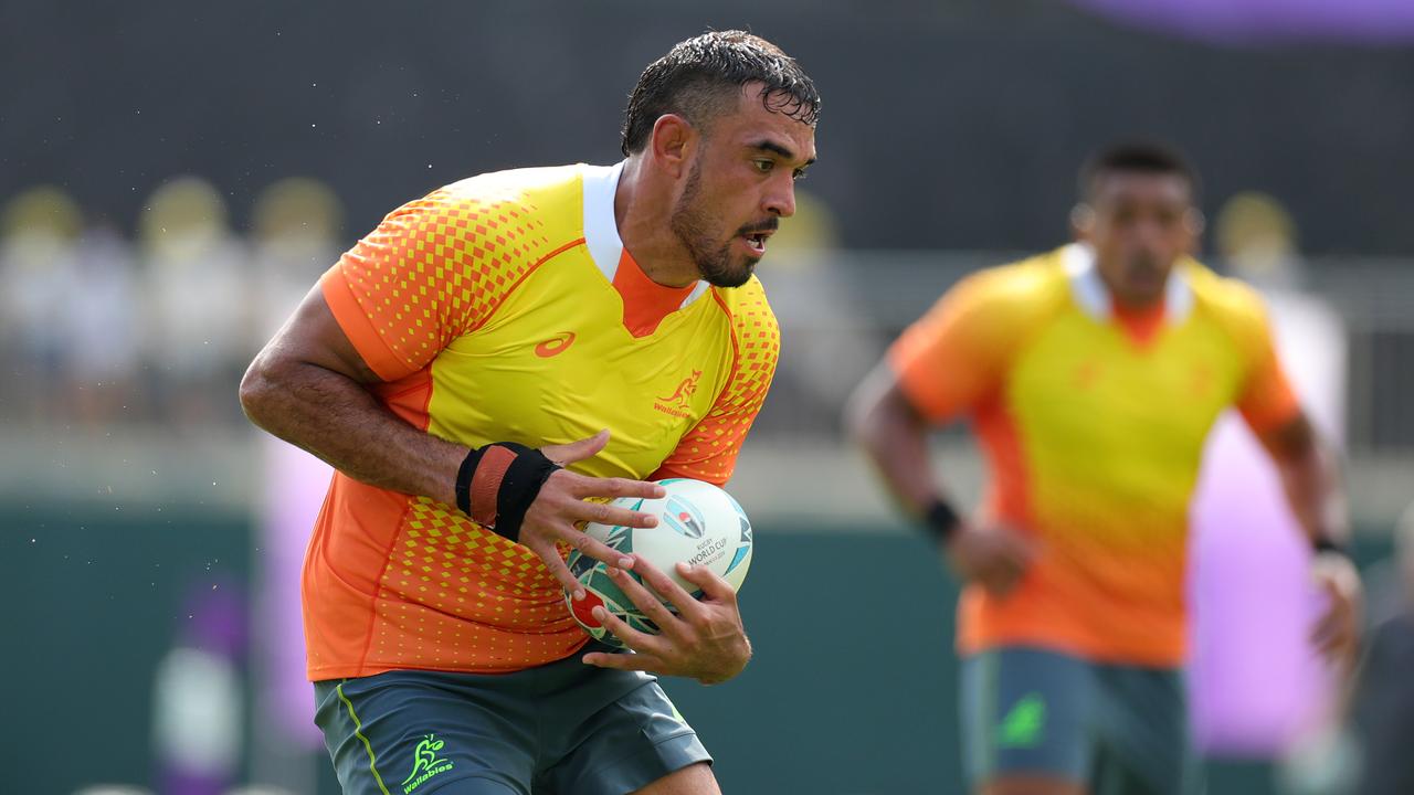 Rory Arnold of Australia gathers the ball during a training session at Odawara Stadium.