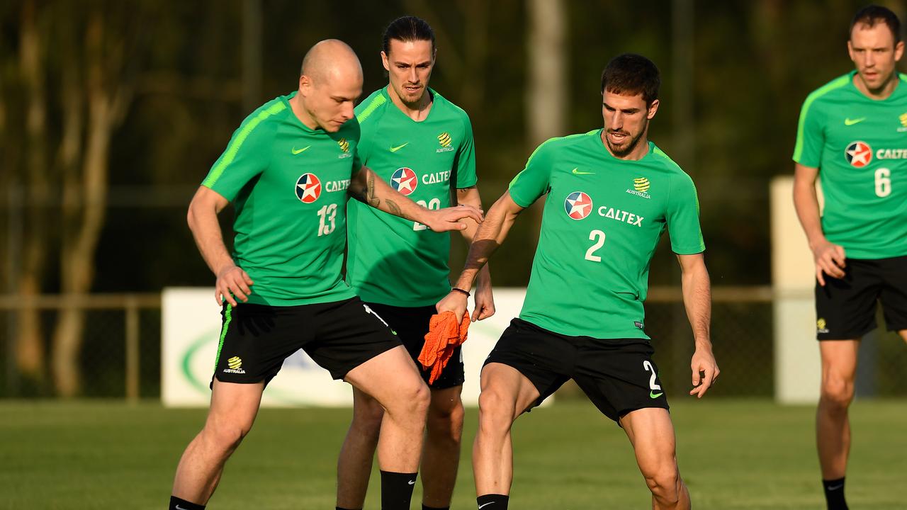 Socceroos trio (from left) Aaron Mooy, Jackson Irvine and Milos Degenek are preparing for Australia’s World Cup qualifier against Vietnam. Picture: AAP Image/Albert Perez