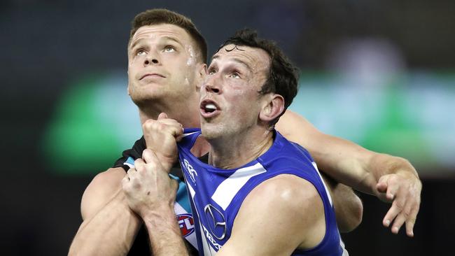 Todd Goldstein competes against Port Adelaide ruckman Peter Ladhams in Round 22, 2019. Picture: Dylan Burns/AFL Photos