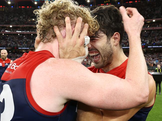 PERTH. 25/09/2021. AFL Grand Final.  Melbourne vs Western Bulldogs at Optus Stadium, Perth.  . Christian Petracca and Clayton Oliver of the Demons  hug after winning the premiership   . Photo by Michael Klein