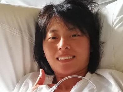 Gold Coast Chinese tourist Yang Chen in hospital Monday.