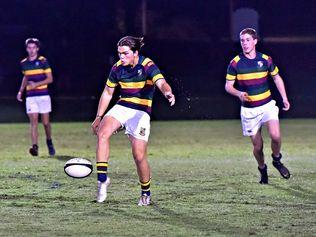 Matthew Flinders against Grammar First XV rugby union match.Grammar's Max Gow kicks ahead.