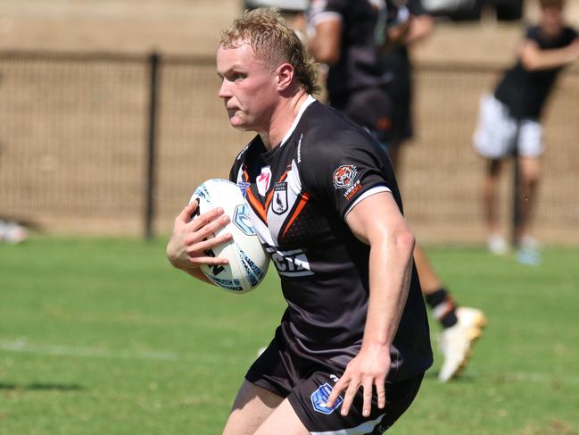 Lachlan Bush hits it up for Wests in the SG Ball Cup in 2023. Picture: Warren Gannon Photography