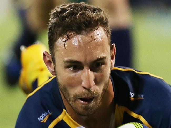 CANBERRA, AUSTRALIA - FEBRUARY 13: Nic White of the Brumbies scores a try during the round one Super Rugby match between the Brumbies and the Reds at GIO Stadium on February 13, 2015 in Canberra, Australia. (Photo by Stefan Postles/Getty Images)