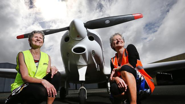 (L-R) Identical twins  Lesleigh Griffin and Billie Hicks prepare for the Circum- Tasmania Challenge at Wynyard Aero Club. Picture Chris Kidd