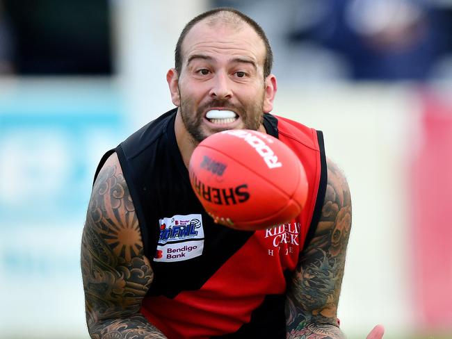 Dean Galea of Riddell marks during the round two RDFNL Bendigo Bank Seniors match between Riddell and Kyneton at Riddells Creek Recreation Reserve, on April 13, 2024, in Diggers Rest, Australia. (Photo by Josh Chadwick)