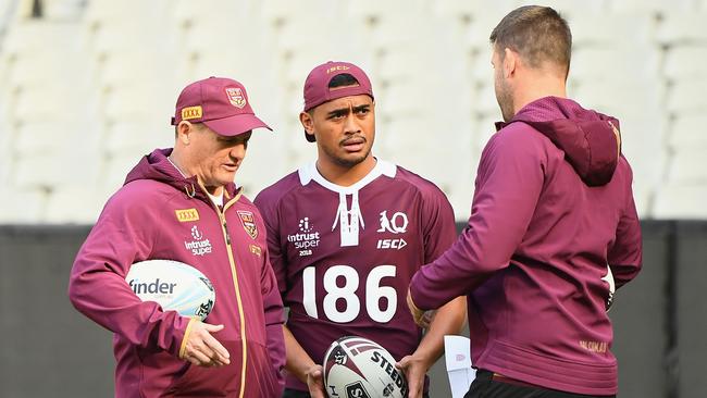 Queensland coach Kevin Walters (left) speaks with Anthony Milford (middle — ahead of tonight’s first State of Origin clash at the MCG. Photo: Getty Images