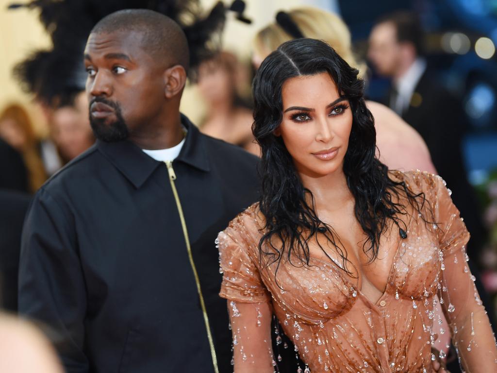 Kanye looks like he’d rather be anywhere else. Picture: Dimitrios Kambouris/Getty Images for The Met Museum/Vogue