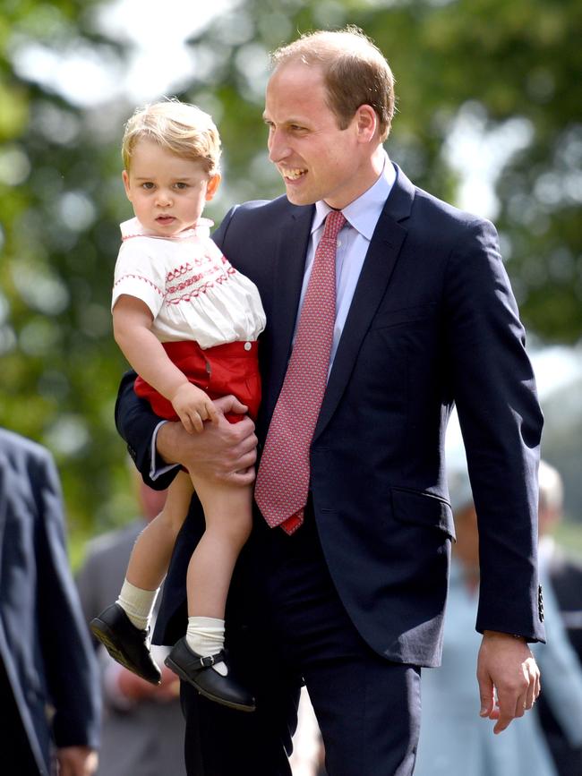 Prince William, Duke of Cambridge and Prince George of Cambridge walk past crowds as they leave the Church of St Mary Magdalene on the Sandringham Estate after the Christening of Princess Charlotte of Cambridge on July 5, 2015 in King’s Lynn, England. Picture: Getty