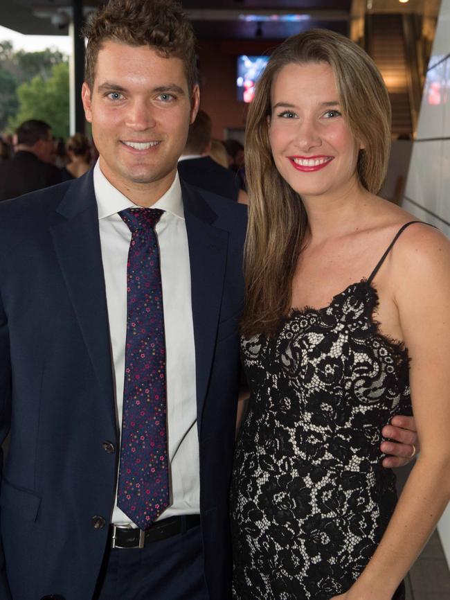 Alex Carey with wife Eloise who is due to give birth later this year.