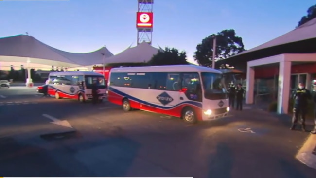 At least two mini-bus loads of Victoria Police arrived at the petrol station truck drivers planned to meet up early this morning. Picture: Nine