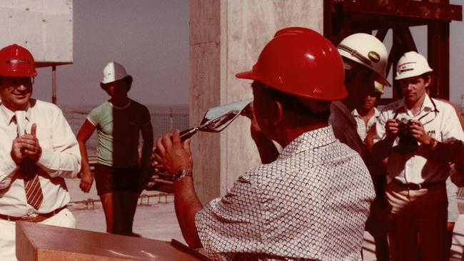 Kerry Manolas (left) on the rooftop of the Sheraton Darwin in 1986. Mr Manolas sadly died aged 84 after a long battle with Parkinson's disease. Picture: Supplied/Manolas family