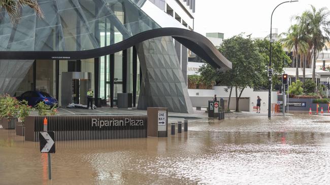 Flooding on Creek Street in the Brisbane CBD following three days of torrential rain. Picture: Getty Images