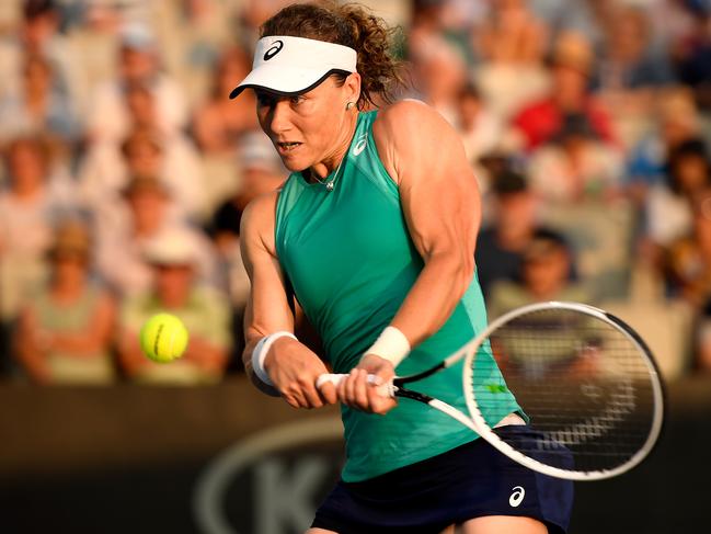 Samantha Stosur hammers the ball back against Germany’s Angelique Kerber.