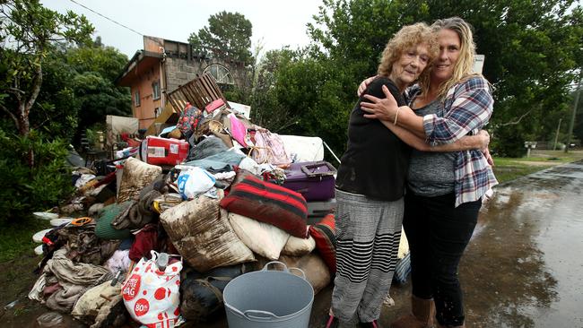 Krysia Mailo returns to her destroyed house with her mother Yvonne Burt. Nathan Edwards