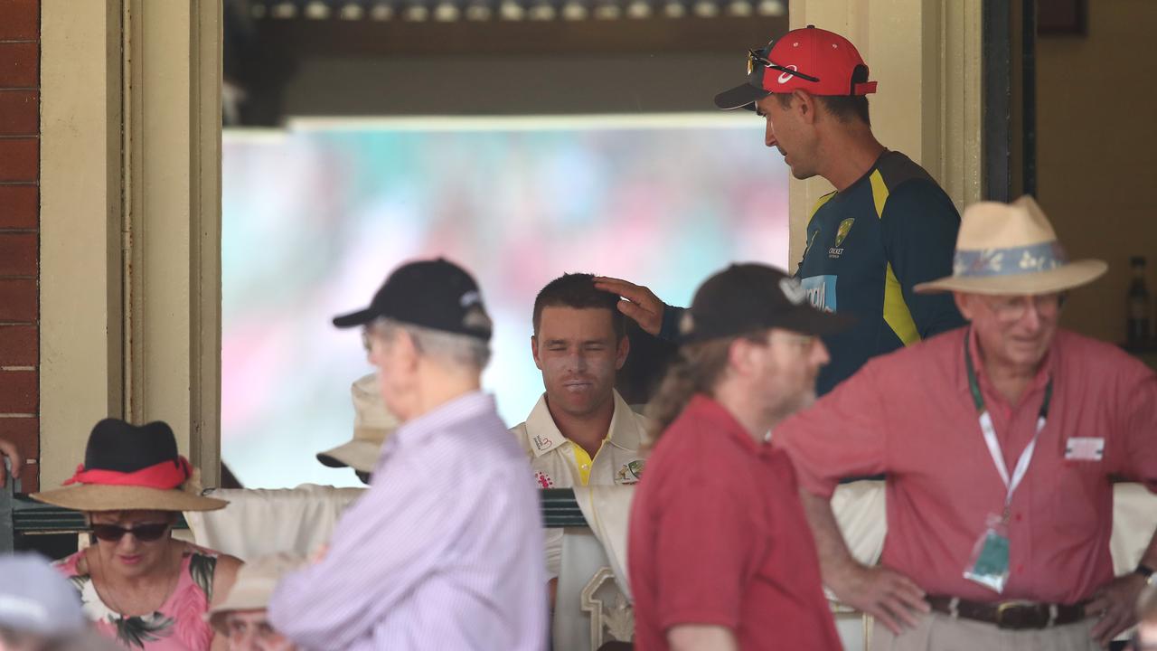 Justin Langer comforts Marcus Harris. Photo: Ryan Pierse/Getty Images.