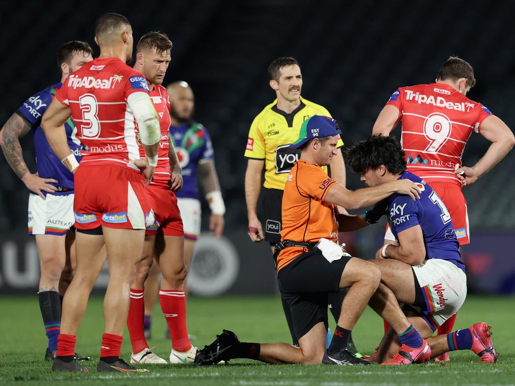 Tohu Harris of the Warriors failed his HIA and injured his shoulder after an attempted tackle on Tariq Sims. Picture Ashley Feder/Getty Images