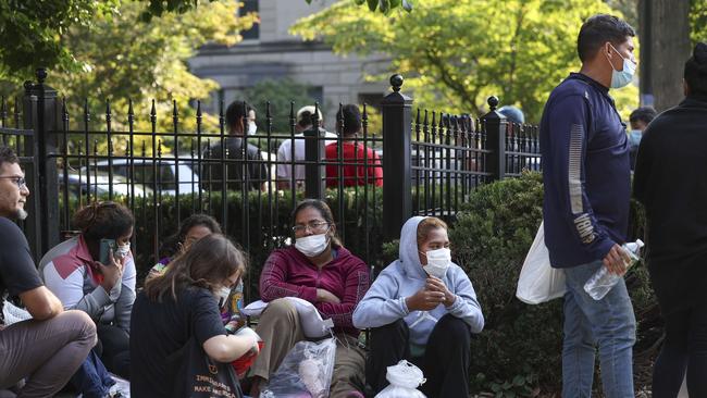 Migrants from Central and South America wait near Kamala Harris’s official residence in Washington, D.C., after being bussed there by Texas Gov. Abbott, Sept. 15. Picture: Kevin Dietsch/Getty Images